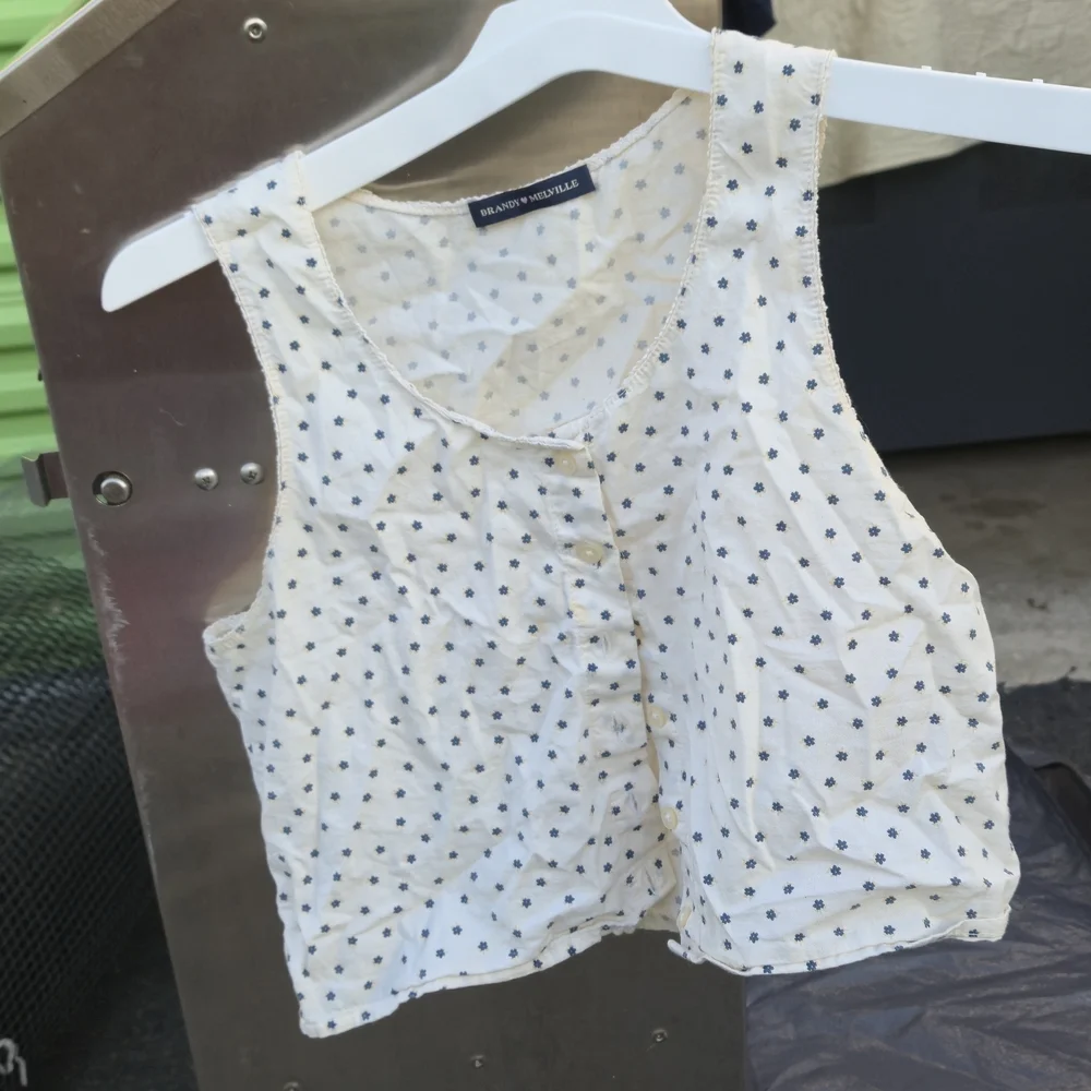 Brandy Melville Cream Tank with Tiny Blue Floral Print - Picture 3 of 3